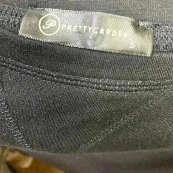 Pretty Garden Long sleeved black sweatshirt with 2 stripes on wrists. Size Small - Picture 3 of 3